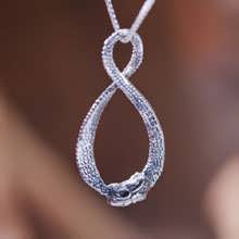 Dragon de l’Infini pendentif argent Dragon de l’Infini pendentif argent