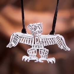 A silver Native American Eagle pendant