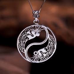 A silver Yin Yang cranes pendant. One of my favorite designs....