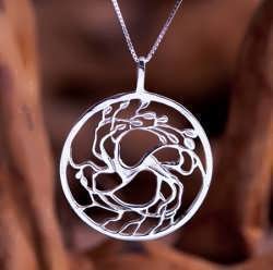 A silver Tree of Love pendant
