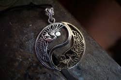 A finished unique gold and silver version of the Yin Yang symbol