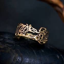 An 18k gold Ouroboros Ring