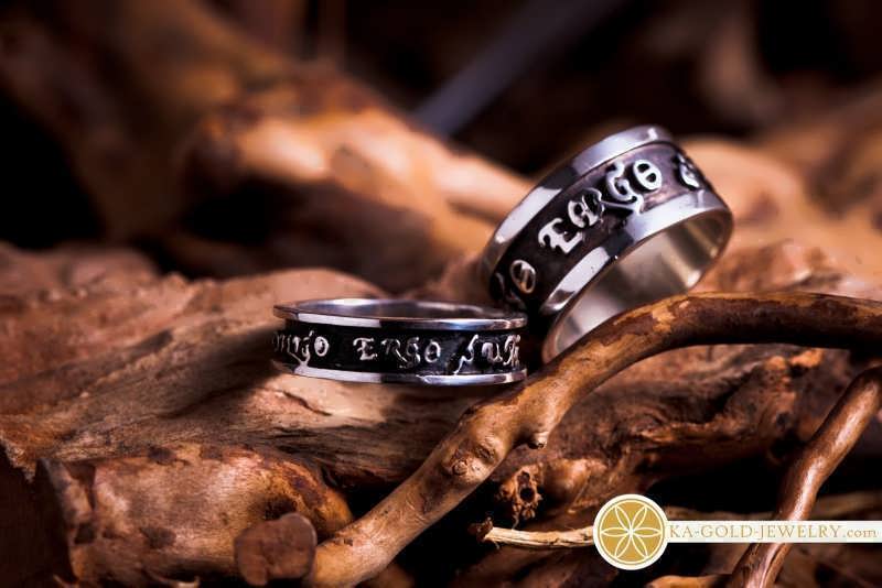 Two "Diligo ergo Sum" rings that were created for a couple in Australia