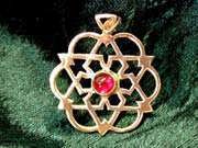 Inlaid egg of life star gold with Garnet